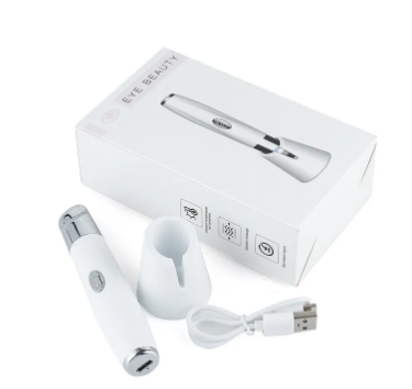 Electric Eye & Face Massager wand beside its retail box